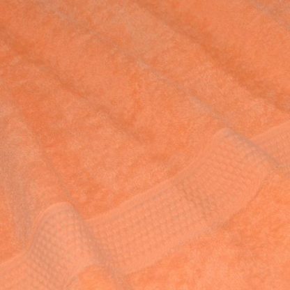 Полотенце махровое персиковое
